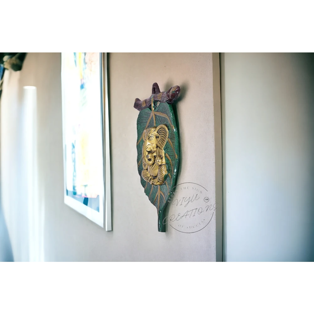 Golden Metal Lord Ganesha| Red Dhoti on Green Leaf