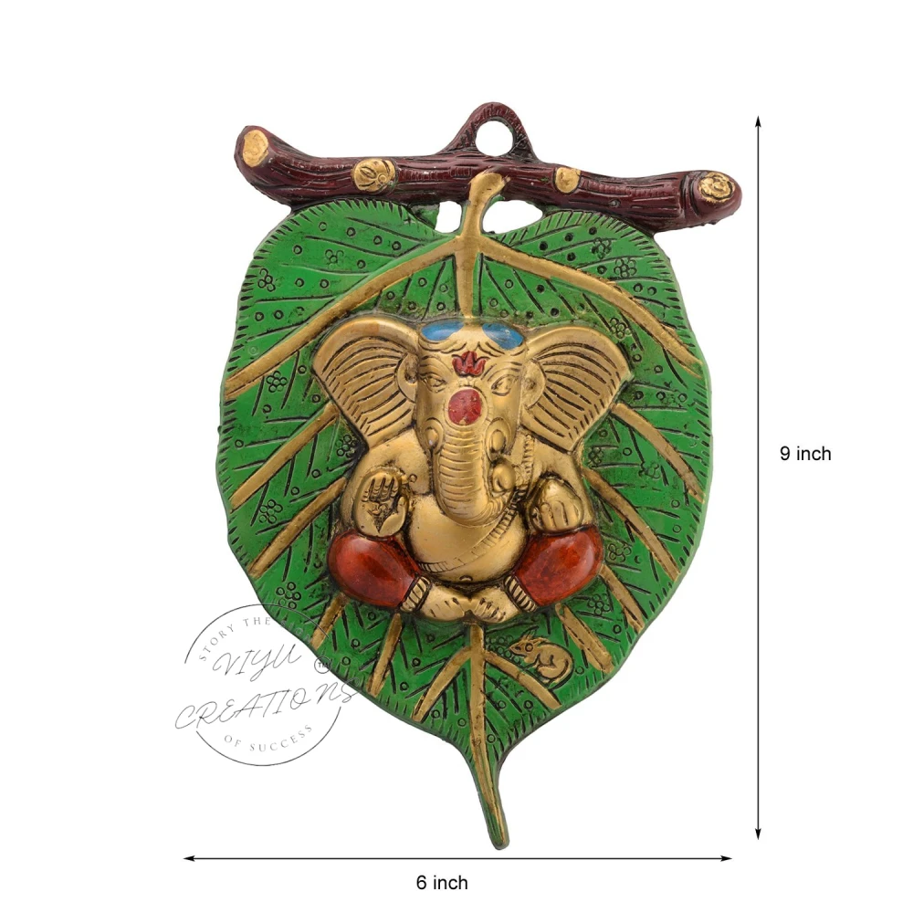 Golden Metal Lord Ganesha| Red Dhoti on Green Leaf