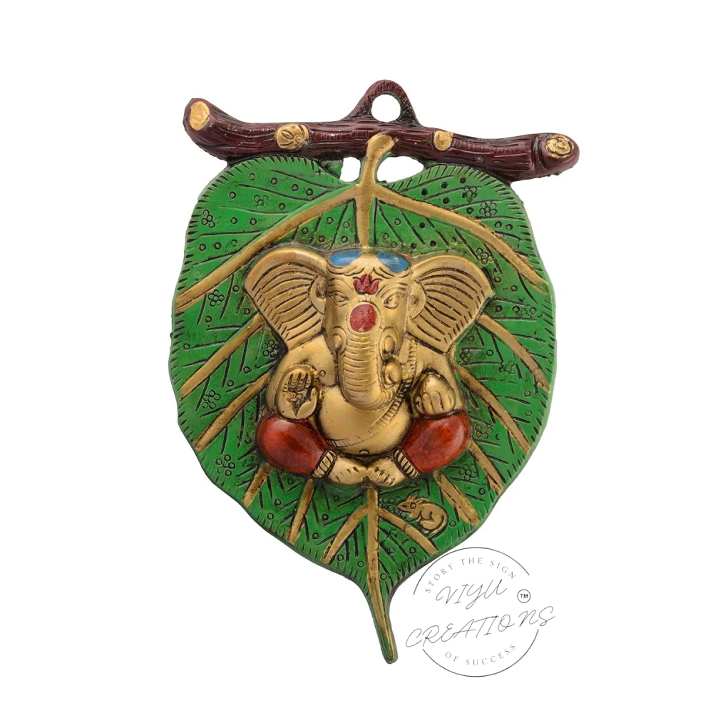 Golden Metal Lord Ganesha| Red Dhoti on Green Leaf