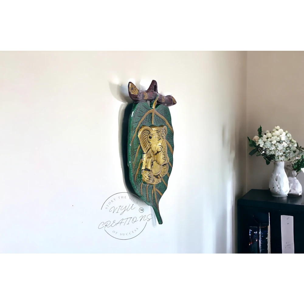 Golden Metal Lord Ganesha| Red Dhoti on Green Leaf