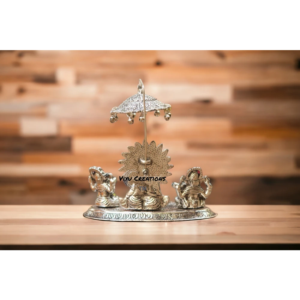 Metal Musical Ganesh with Instrument Set on Leaf